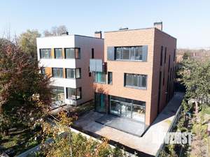 Коттедж 387м², 3-этажный, участок 4 сот.