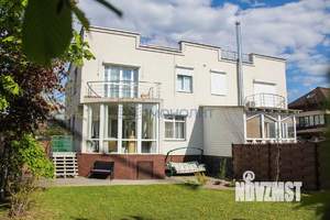 Коттедж 307м², 3-этажный, участок 5 сот.  