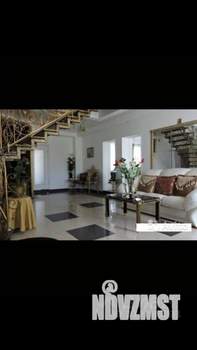 Коттедж 600м², 3-этажный, участок 20 сот.  
